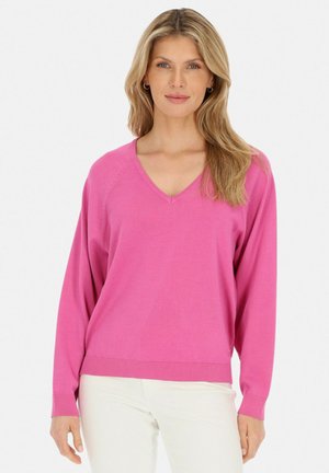 Sweter z dekoltem w serek, z długim rękawem w jaskrawym różowym kolorze, z prążkowanym wykończeniem na dole i przy mankietach; wykonany z miękkiego, gładkiego dzianiny.