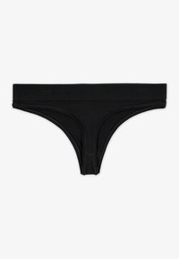 String noir en tissu doux avec un design sans couture. Dispose d'une large ceinture élastique et d'une couverture minimale.