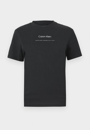 Black cotton T-shirt with a crew neckline, short sleeves, and white printed "Calvin Klein" logo and "Established 1968" text.