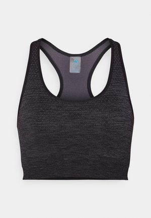 Sutiã desportivo preto com design de costas nadador, tecido texturizado e uma pequena etiqueta com o logo no interior. Feito de material elástico e que afasta a humidade.