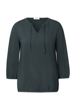 Blouse légère vert foncé avec un décolleté en V, un détail à cordon de serrage et des manches trois-quarts. Présente des poignets froncés et une coupe ample.