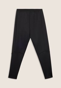 Leggings noirs en matériau extensible, dotés d'une coupe ajustée, d'une taille élastique et d'accents aux genoux sans coutures pour un confort accru.