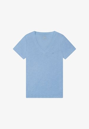 T-shirt azzurro chiaro a maniche corte con scollo a V e logo "Lee" discreto sul petto, distesa su sfondo bianco.