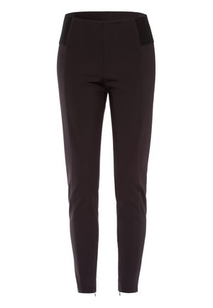 Schwarze, dehnbare Hose mit figurbetontem Design, die eine glatte Oberfläche und einen Bund mit einem kontrastierenden schwarzen Einsatz aufweist.