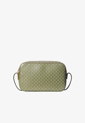 Sac bandoulière rectangulaire vert olive avec fermeture éclair dorée et motif géométrique en lignes diagonales, avec fines bretelles latérales.