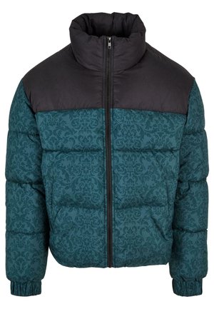 Giacca imbottita con una parte inferiore a fantasia teal e una parte superiore nera. Presenta un colletto alto e una chiusura centrale con zip.