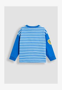 Niet geselecteerd, blue racoon