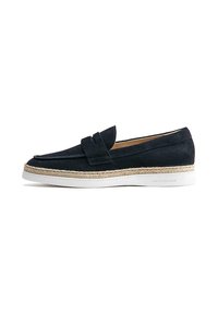 Schwarzer Wildlederschuh ohne Schnürsenkel mit einer Plateausohle, die einen espadrille-inspirierten Juteakzent entlang des Randes und eine weiße Gummisohle aufweist.