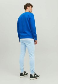 Jack & Jones JPSTWILL AIR PANTS - Træningsbukser - mountain spring