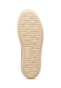 Rubber sneaker sole in light beige; features circular patterns and grooves for traction; logo embossed in the center.
