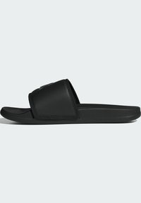 Black slide sandal featuring a textured strap and a smooth sole, designed with a slip-on style for easy wear and comfort.