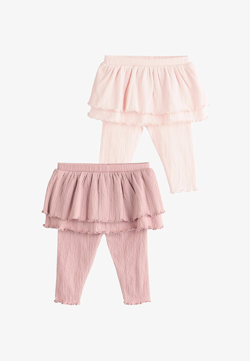 Dva sady legín s vrstvenými sukňami, vyrobené z textúrovaného materiálu. Farby sú svetlo ružová a fialová, s volánovými okrajmi.