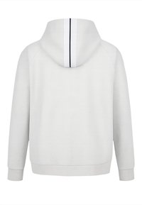 Hvid hættetrøje med en lodret sort stribe, der løber ned midt på hætten, set bagfra.