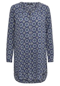 Camicia a fantasia blu con pattina dei bottoni, maniche lunghe e orlo curvo. Presenta motivi circolari in bianco e dettagli verdi.