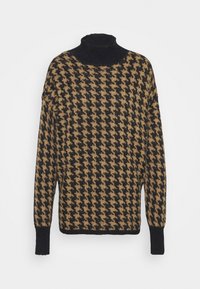 Zwart-bruine oversized trui met hondentandpatroon, hoge hals en lange geribbelde manchetten.