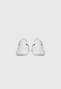 White athletic shoes with a smooth textile upper, rounded toe, padded collar, and contrasting black accents on the heel and sides.