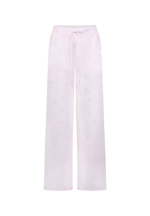 Lichtroze wijde broek met een elastische tailleband en kleine rode hartjes verspreid over de stof.