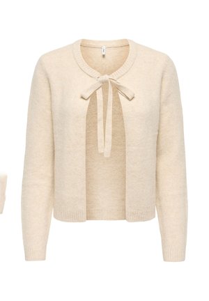 Beige gebreid vest met lange mouwen en een strikdetail aan de voorkant, gemaakt van een textuurrijke stof met geribbelde manchetten en zoom.