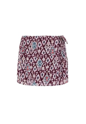 Gonna corta a portafoglio con motivo geometrico e floreale in bordeaux, bianco, blu e rosa, con chiusura laterale a nodo intrecciato.