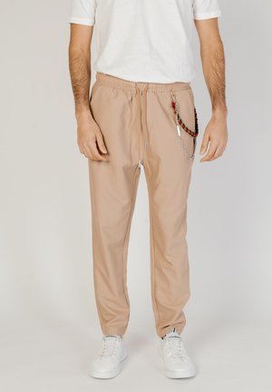 Pantalones deportivos - beige