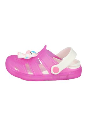 Sandalia infantil rosa translúcida con correa blanca ajustable en el talón y decoración de unicornio en la parte superior.