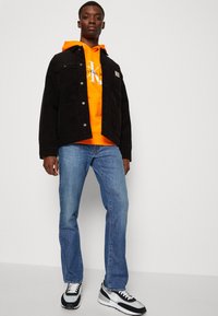 Levi's® 511 SLIM - Jeans straight leg - chanterelle cool