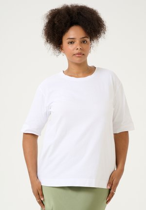Vit bomull t-shirt med korta ärmar, rund hals, avslappnad passform, med en slät textur och sidslitsar för ökad komfort.