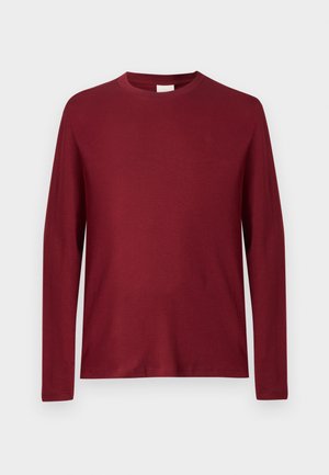 Lange mouw T-shirt in bordeauxrood, gemaakt van zachte katoen. Beschikt over een ronde hals en een subtiele logo op de borst. Gladde textuur, casual ontwerp.