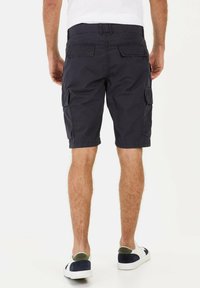 Navy blue cargo shorts with a straight cut, featuring two side pockets and two back pockets, made from lightweight fabric.
