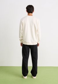 Ellesse MACCHIE - Tréningruha alsók - black