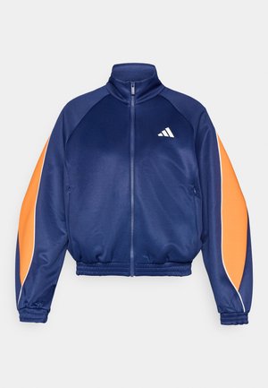 Navy blue zip-up jacket with orange accents. Features a high collar, elastic waistband, and ribbed cuffs. White logo on the chest.