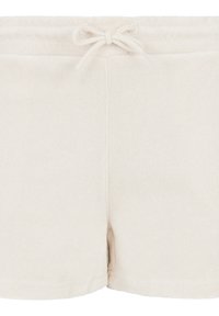 Shorts couleur crème en tissu éponge doux, dotés d'une taille élastique avec cordon de serrage et de petites fentes latérales pour plus de liberté de mouvement.