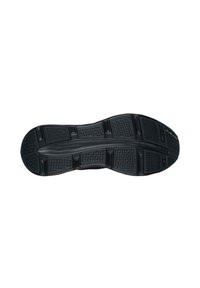 Schwarze Gummisohle mit einem strukturierten Design, das hexagonale Muster, erhabene Bereiche und eine zentrale Rille für Traktion aufweist.