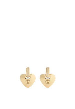 Boucles d'oreilles en or en forme de cœur avec un petit fermoir articulé accentué et un motif en haut. Présente un logo gravé sur un côté.