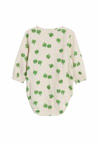 Baby jumpsuit med gröna äppelmönster i mjuk, krämfärgad bomull. Har lång ärm, rynkade manschetter och en rundad nederkant.