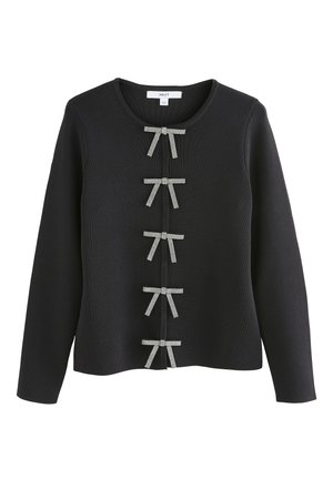 Crni pleteni džemper s okruglim izrezom i nizovima ukrasnih mašnica u kontrastnom uzorku niz prednju stranu.