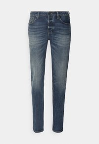 Denimjeans i medelblått med en urtvättad finish, som har fem fickor, dragkedja och subtil slitage på framsidan och baksidan.