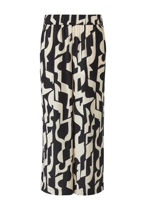 Schwarz-weiße Schlafanzughosen mit abstrakten, Zickzack-Mustern. Elastischer Bund und weite Beine, gefertigt aus weichem, strukturiertem Stoff.