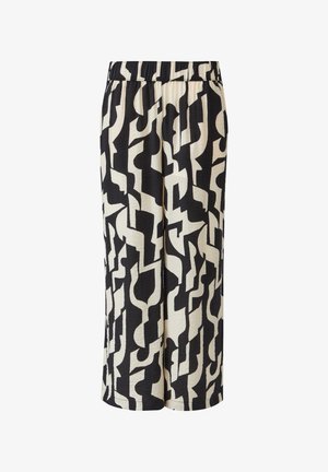 Črne in kremne pižamske hlače z abstraktnimi, zigzag vzorci. Elastični pas in široka nogavica, izdelane iz mehkega, teksturiranega blaga.