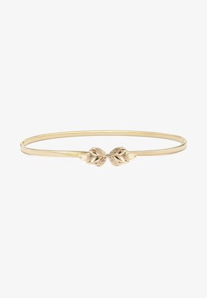 Gold-tone metal bangle with a smooth, slender band and a decorative leaf motif in the center, featuring textured detailing and an elegant design.