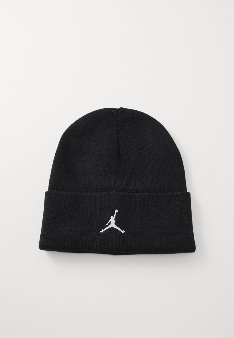 Beanie noir en tricot avec un revers. Présente un logo Jumpman brodé en blanc sur le devant. Texture douce, design ajusté.