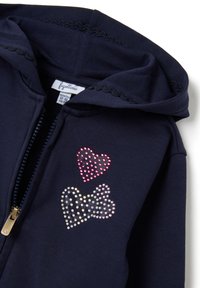 Sudadera con cremallera en color azul marino y un borde festoneado, que presenta diseños de corazones de strass en color rosa y morado en la parte frontal. Fabricada en suave algodón.