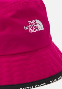 The North Face CYPRESS BUCKET UNISEX - Kepurė - pink primrose