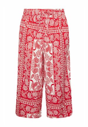 Punavalkoiset kuviolliset nyörishortsit, joissa on paisley- ja kukkakuvioita, polvipituinen ja löysä malli.