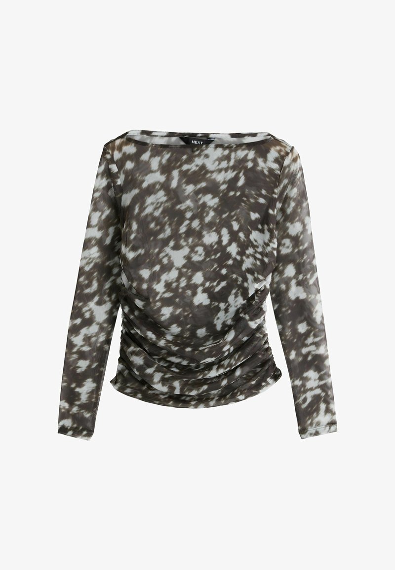 Blouse à manches longues en voile avec motif abstrait noir et blanc, côtés froncés et large encolure bateau.