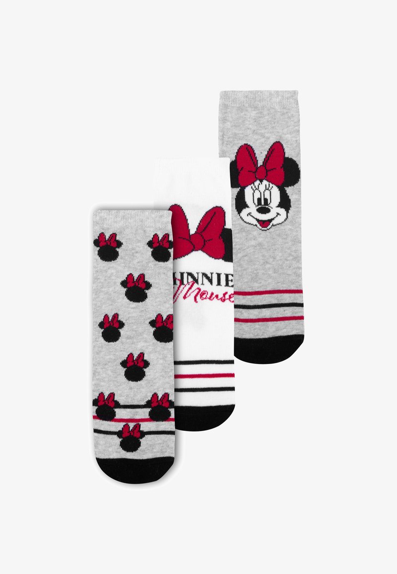Tre paia di calze: un paio bianco con accenti a strisce nere e rosse, un paio grigio con sagome nere e rosse di Minnie Mouse, un paio grigio con il volto di Minnie Mouse.