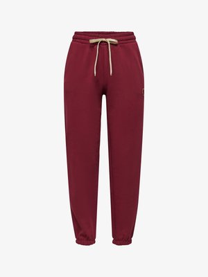 Pantalon de jogging marron avec taille élastique et cordon beige, avec poignets élastiques et un petit cœur brodé sur le côté droit.