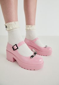 TIRA KETNIPZ FRICK IM SICK EDITION - Platform heels - pink