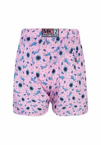 Costumi da bagno rosa con un motivo giocoso di figure blu, orologi e bolle; vita elastica e design ampio.