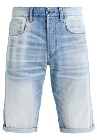 Shorts di jeans azzurri con un aspetto sbiadito, con risvolti, cinque tasche e chiusura con bottone in vita.